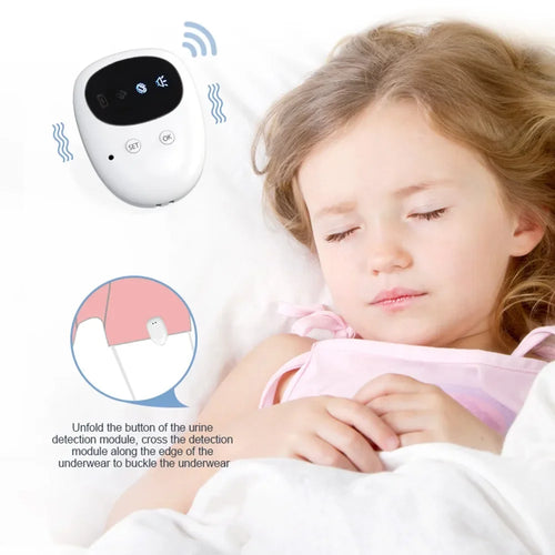 Niña durmiendo con la alarma inalámbrica